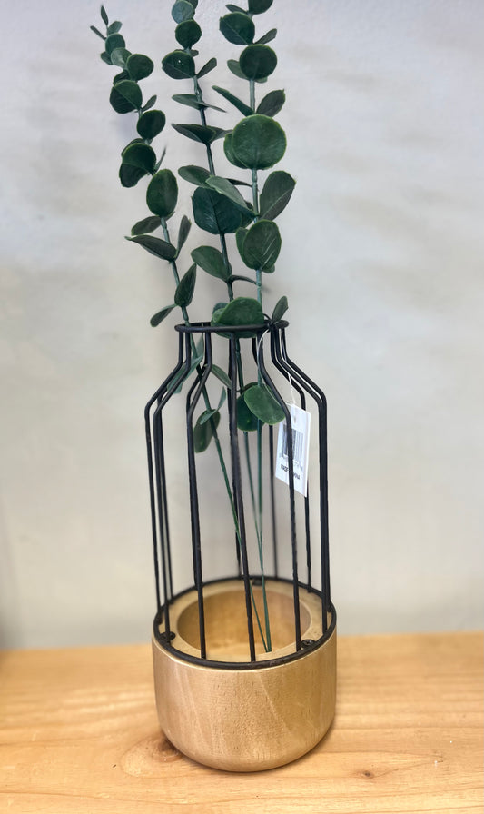 Wire vase with greenery